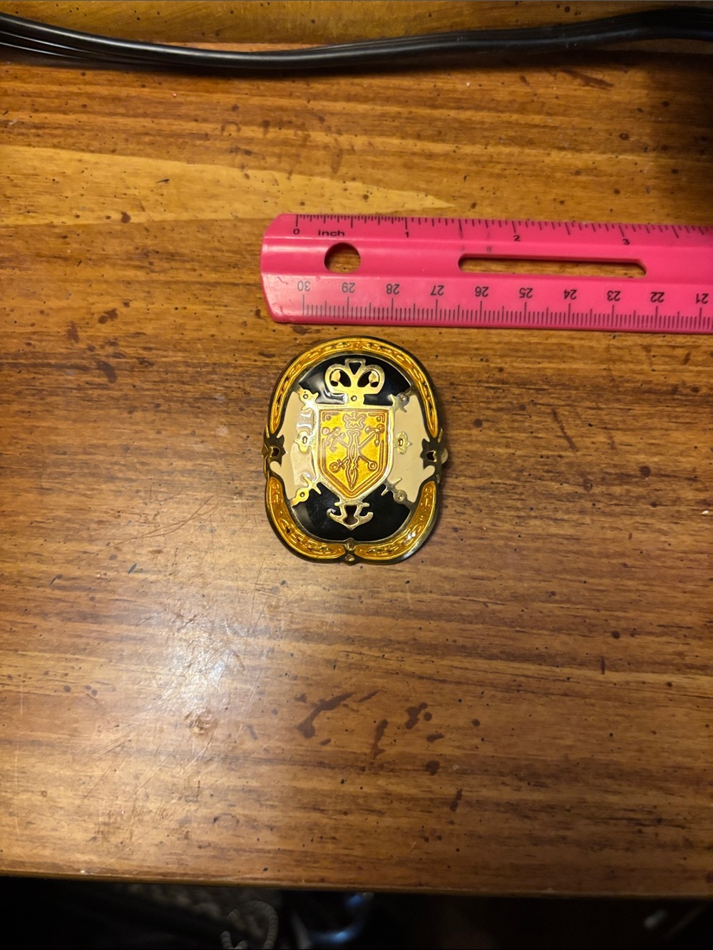 berek Gold and Black Crest Shield Lapel Pin